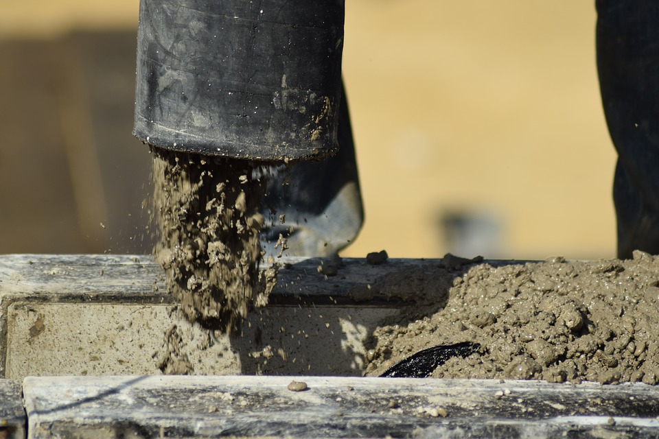 Pouring Concrete from Concrete Pump