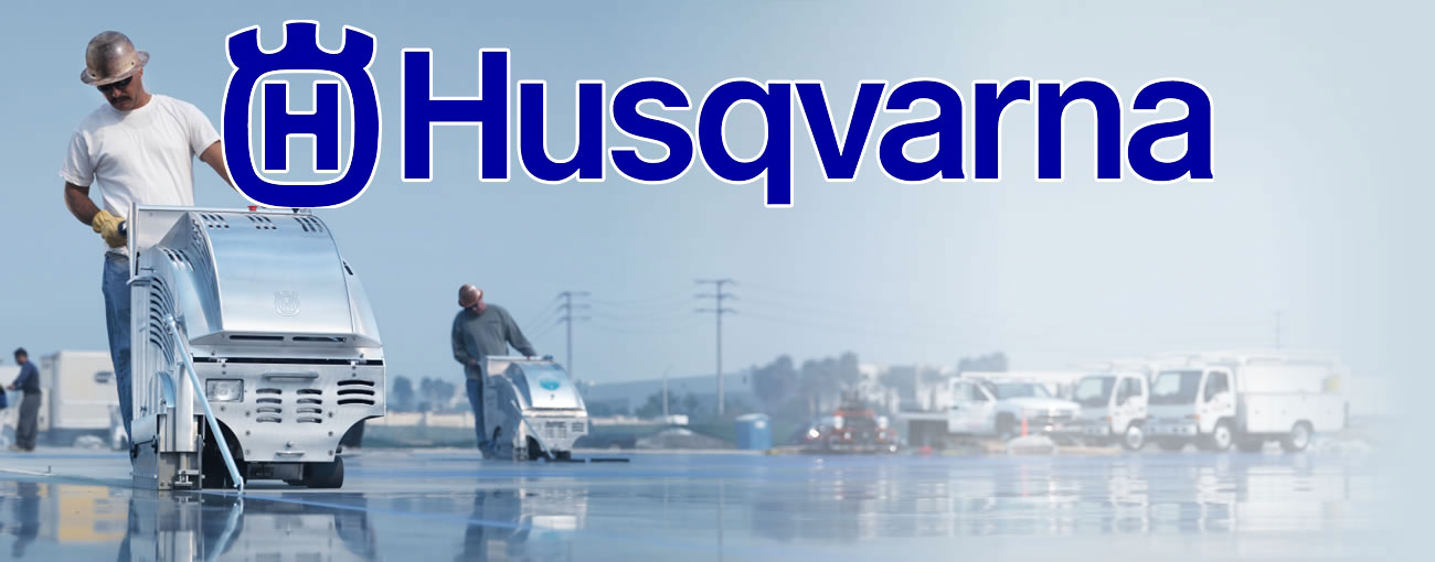 man using a piece of Husqvarna equipment to complete a concrete job