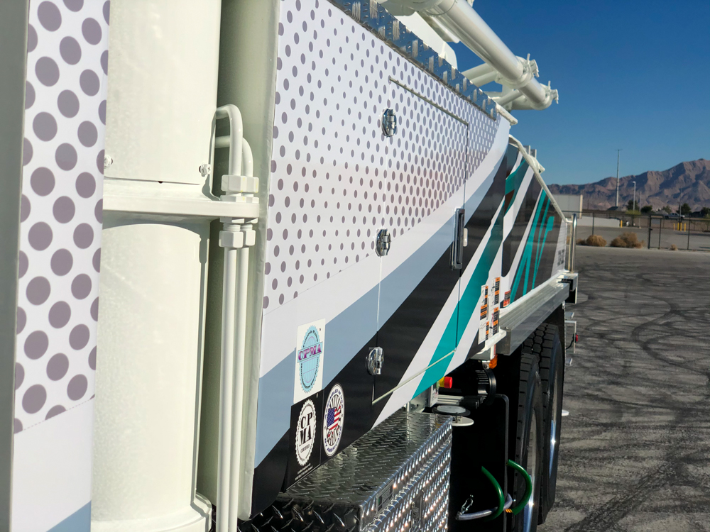 logo stickers on the side of a DY concrete pump at the WOC event