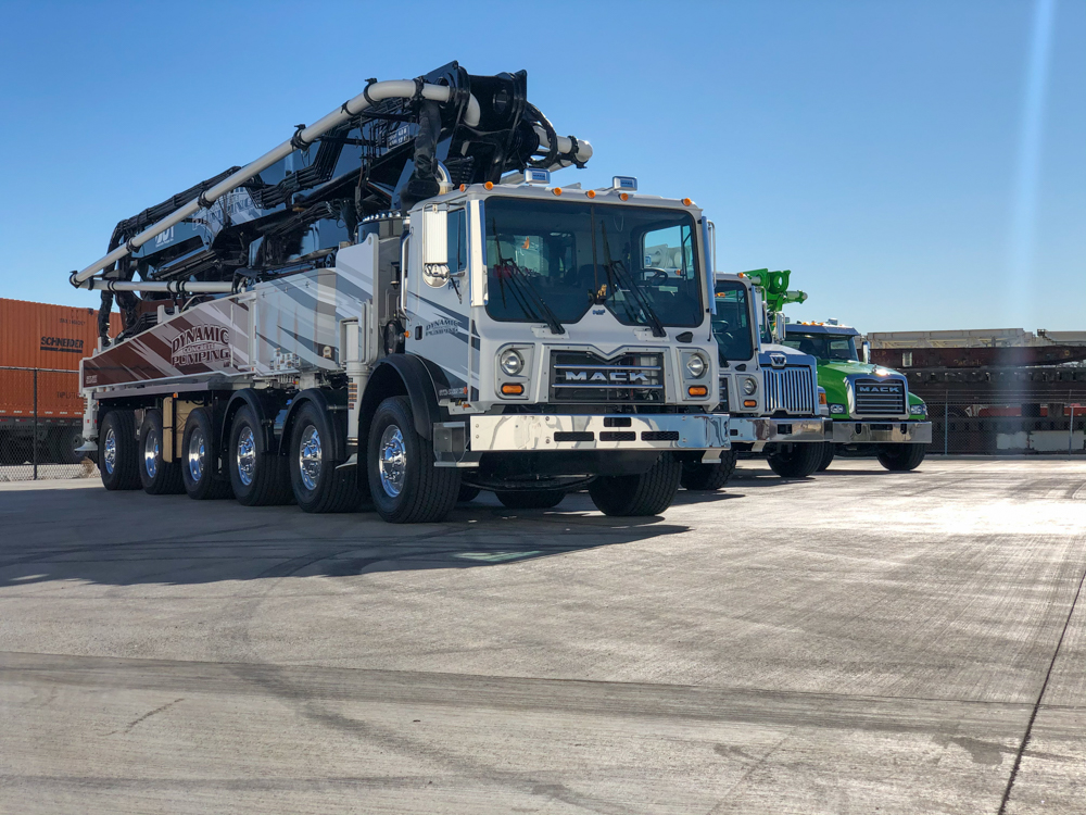 DY Concrete Pumps lined up on display at the WOC event