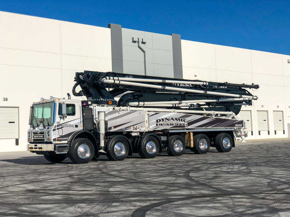 Dynamic Concrete Pumping DY boom pump on display outside of the WOC event