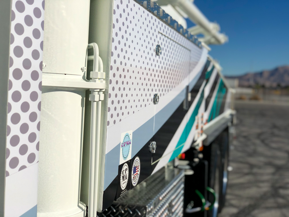 side of DY concrete pump showing polka dot design and certification stickers