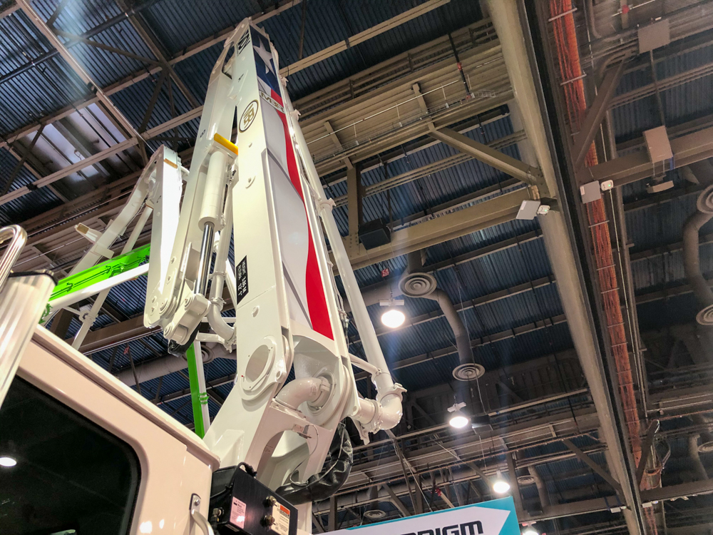 DY concrete pump arm extended inside of the WOC event