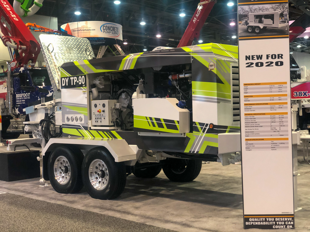 DY Concrete Pumps display describing new features for 2020 in front of a DY TP-90