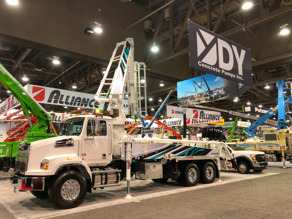 DY concrete pumps being displayed inside of the WOC event