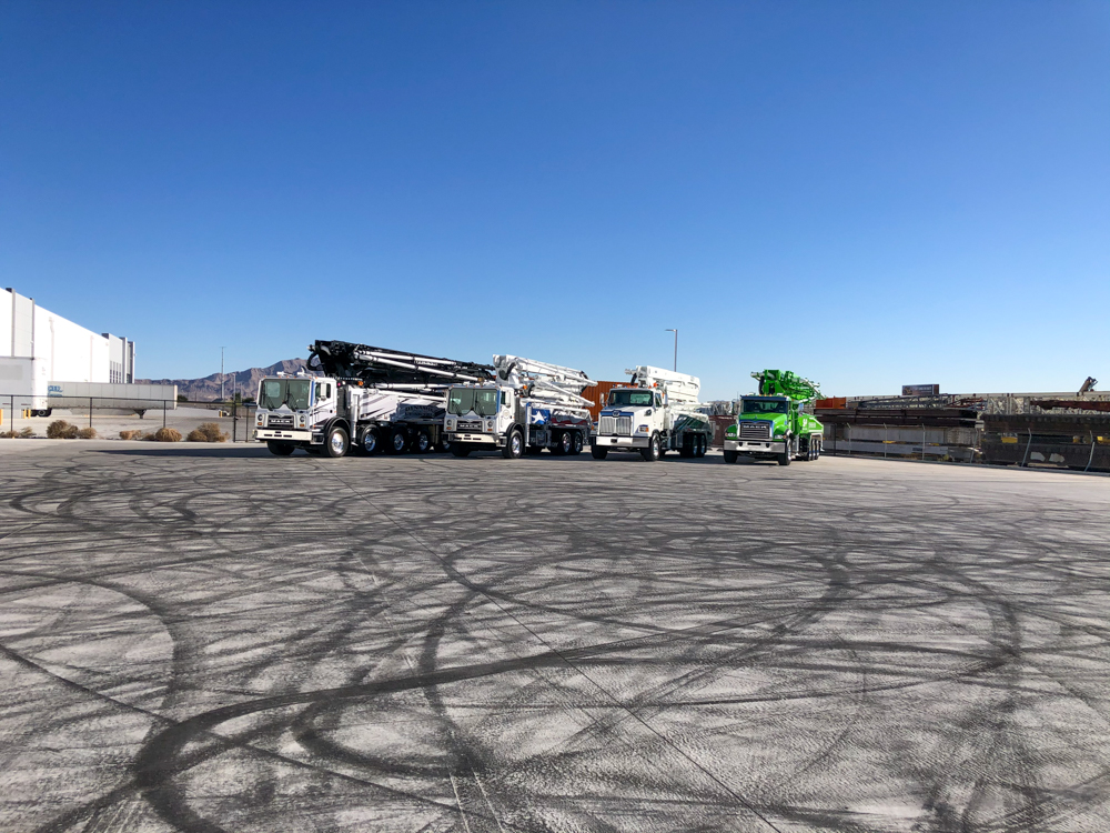 four concrete boom pumps manufactured by DY Concrete Pumps at the WOC event