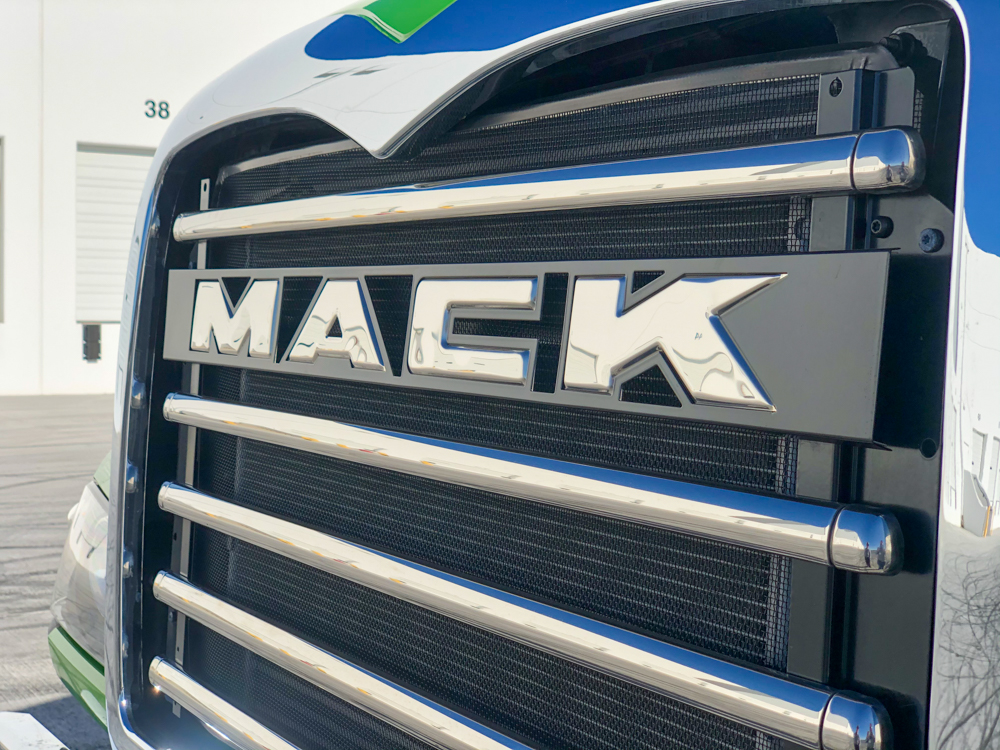 front of a DY concrete pump with Mack chassis