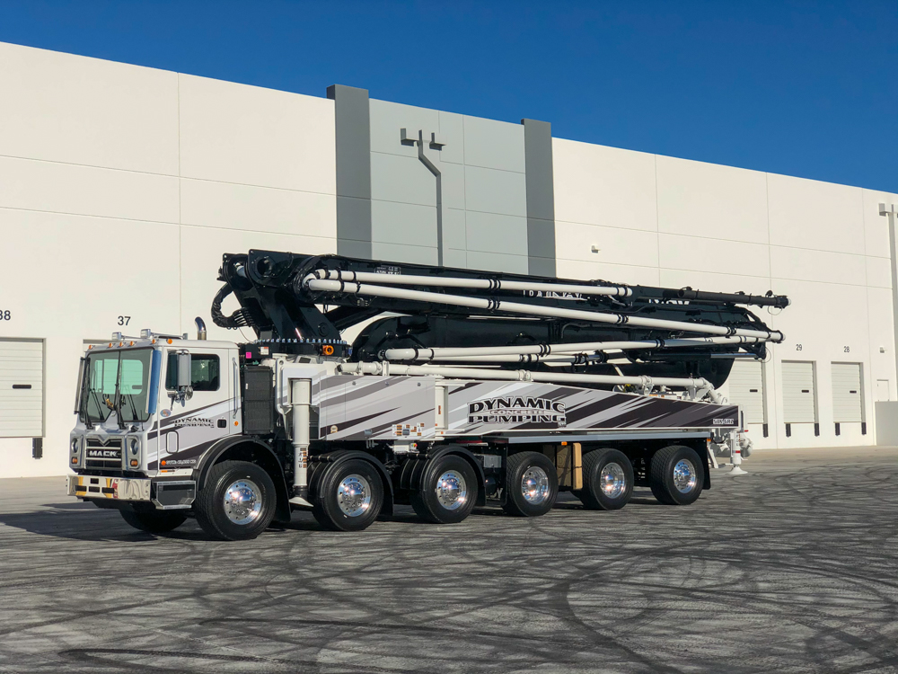 DY 57X-6RZ concrete pump with Dynamic Concrete Pumping logo at the WOC event